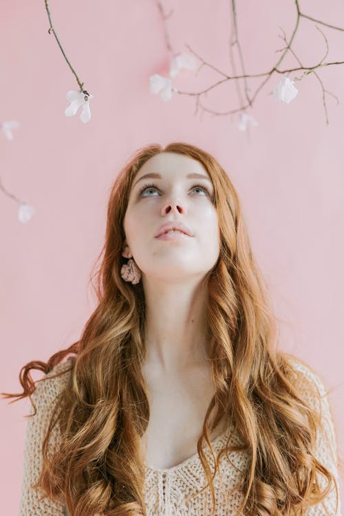Woman Wearing White Knitted Dress